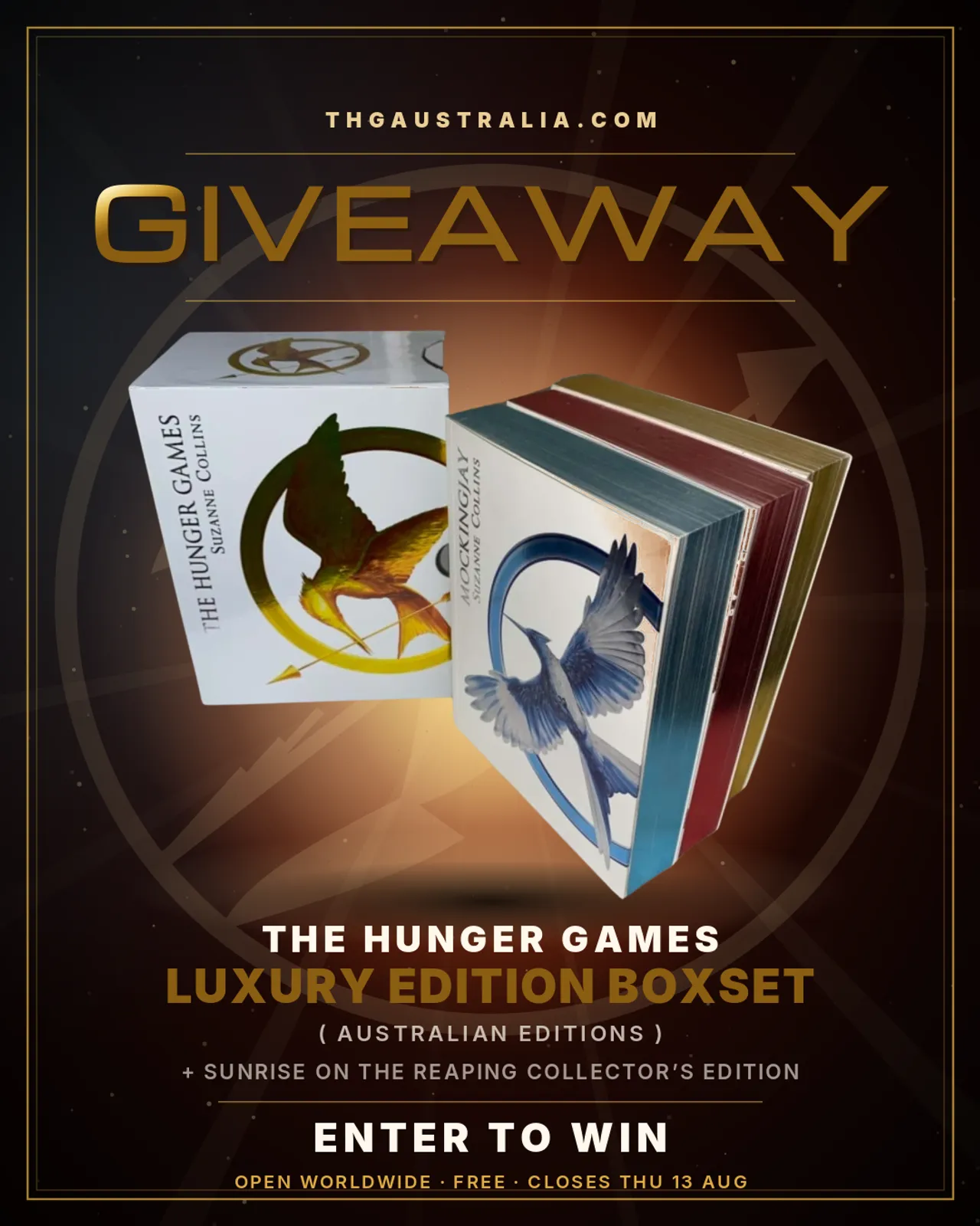 The Hunger Games Luxury Edition boxset with foil-sprayed page edges on an ember-lit giveaway poster